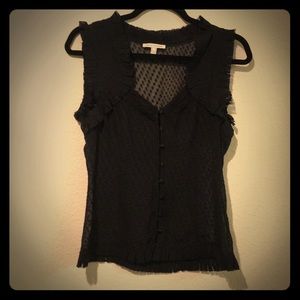 Sleeveless sheer blouse with buttons